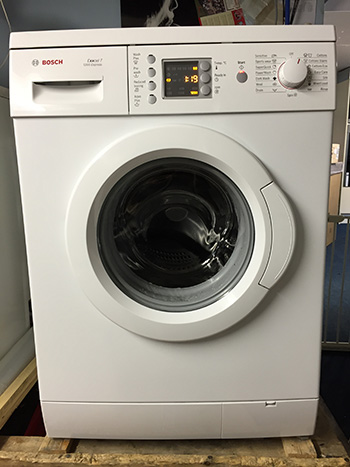 Refurbished silver washing machine